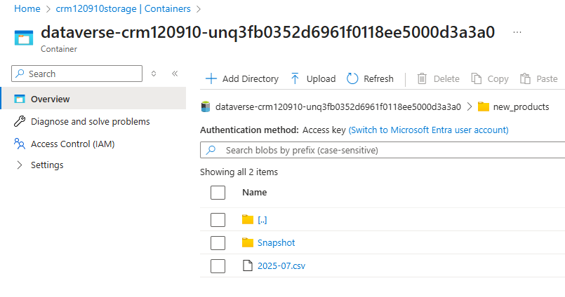 Azure storage container dataverse-crm120910 showing folders Snapshot and a file named 2025-07.csv.